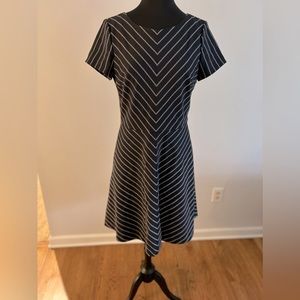 Brooks Brothers dress in traditional men’s tie fabric